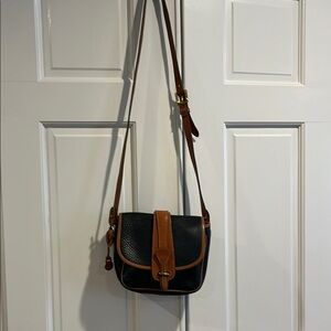 Dooney and Bourke Black and Brown Leather Crossbody Bag.